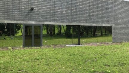 Aesthetic conceiled blastdoors with high load resistance